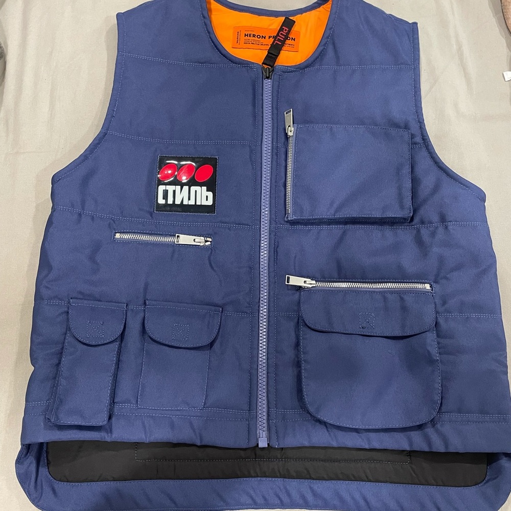 HERON PRESTON
Logo Patch Vest In Blue